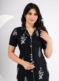Elegant black rayon nightsuit with printed green pattern, comfortable women's sleepwear