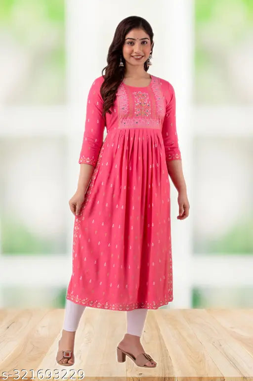 Pink rayon VNYASHRI naira cut kurta with shisha embroidery, round neck, yoke, block print, side slits, calf-length, and solid pattern. High-quality, breathable, and comfortable fabric for women's ethnic wear from India