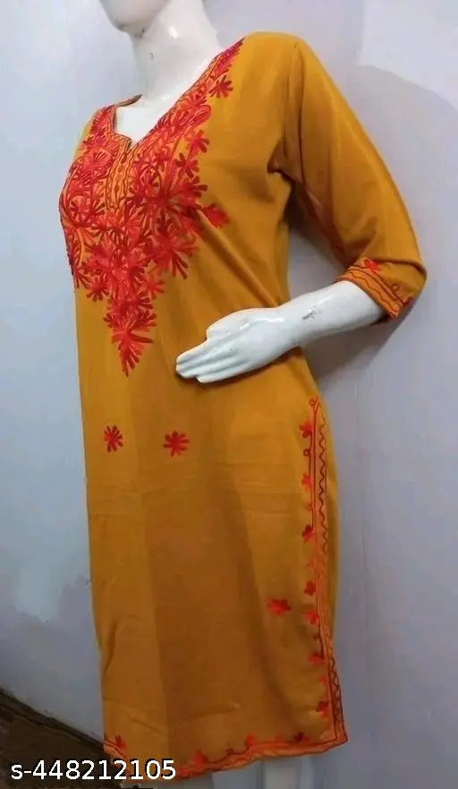 Embroidered woolen kurti, three-quarter sleeves, rich color palette - Indian fashion for women