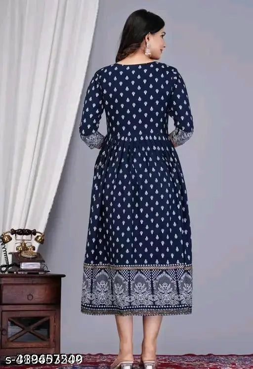 White gold blue printed net rayon top with three-quarter sleeves, available in sizes S to XXXL. Indian origin