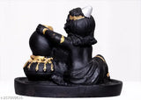 Multicolor MORATER Krishna Idol backflow incense holder with 51 cones, decorative poly resin smoke fountain on display