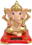 White and red plastic solar-powered hand shaking Lord Ganesha statue for car dashboard or office decor, symbolizing growth, success, and good fortune