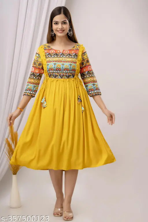 Yellow rayon anarkali kurta with solid print for women on display