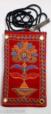 Embroidered PU Rajasthani purse for women, 2 compartments, fits iPhone & Samsung. Vibrant organic cotton fabric, thread & floral embroidery." (106 characters)