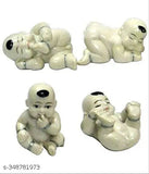 Handcrafted miniature Buddha monk figurines set (4pcs), poly resin Feng Shui showpieces, 5cm x 6cm x 5cm, India origin