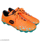 Orange PVC and Eva football shoes for boys, lightweight with water-resistant design, ideal for ground and turf play