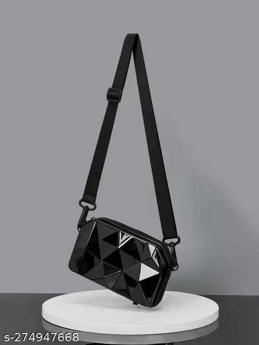 Black acrylic diamond-cut cross body bag, solid pattern with 3 compartments for on-trend accessories