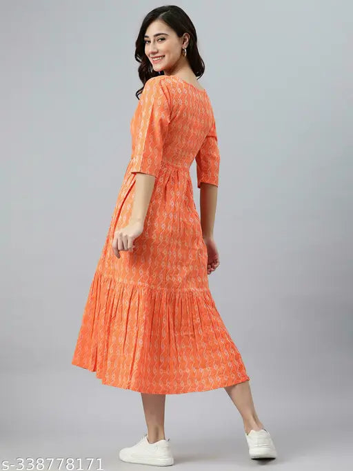 Orange cotton kurti with printed combo, three-quarter sleeves by Taj Trends. Women's XS to XXL sizes available