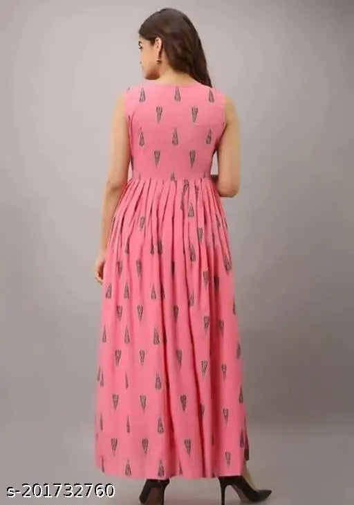 Peach rayon kurti cum gown, printed design for festive or casual wear. Soft and comfortable ethnic attire for women, made in India