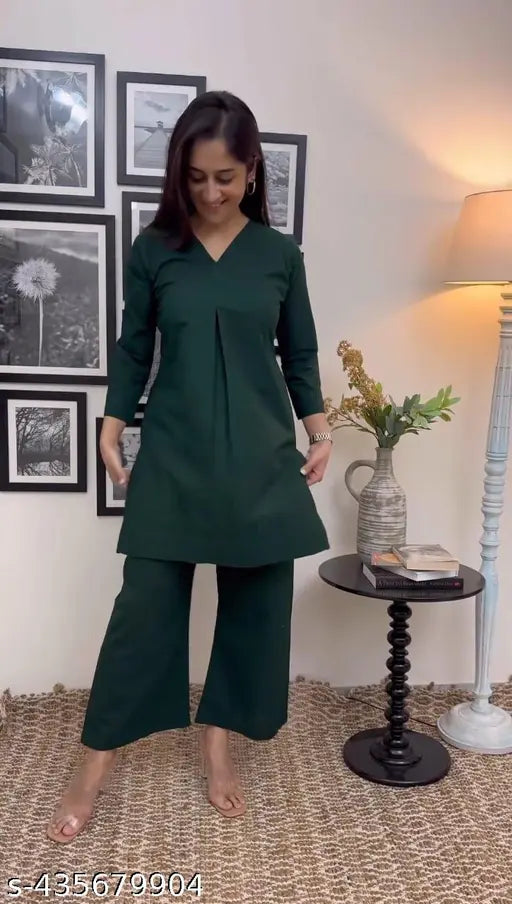 Green rayon kurta set with cotton palazzos for women, black, embroidered neckline and sleeves