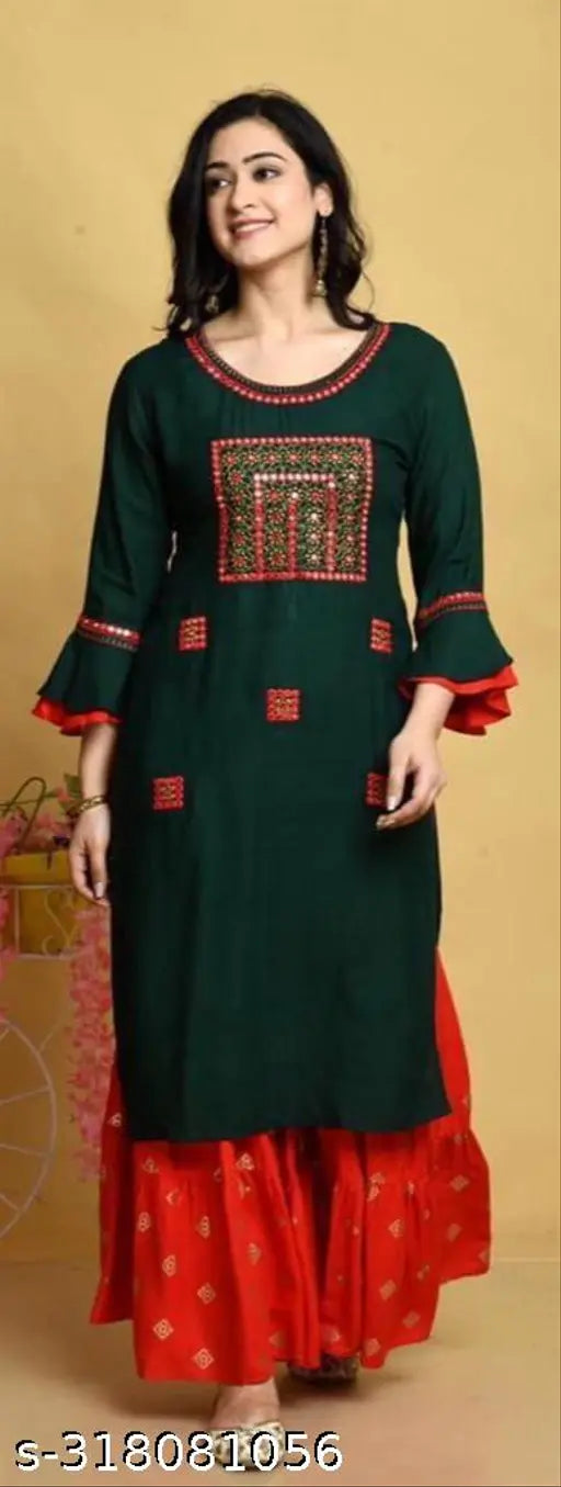 Latest rayon and nylon woman's kurta sharara set with three-quarter sleeves, embroidered pattern, and matching dupatta. Available in unique sizes S-XXXXL. Indian origin