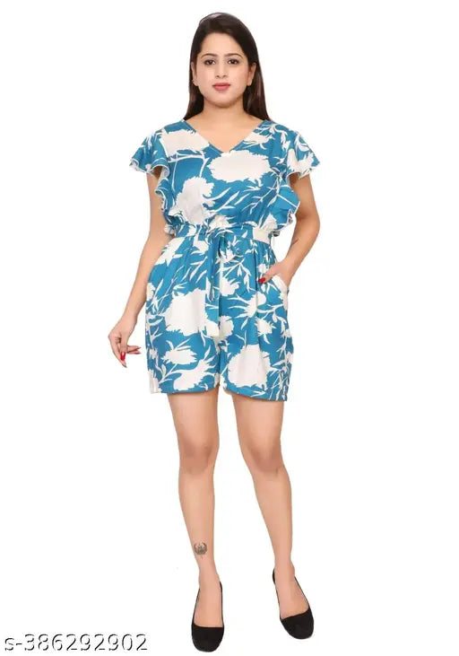 Ladik way blue printed cotton blend casual V neck jumpsuit, short sleeves, floral design for women and girls. Back zip closure, elastic waist and belted, short ruffled sleeves, side pocket. Summer fashion accessory. Made in India
