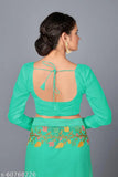Mint green designer net saree with dupion silk blouse, embroidered patterns, ideal for weddings and events. Soft net fabric, free size, originates from India (123 characters)