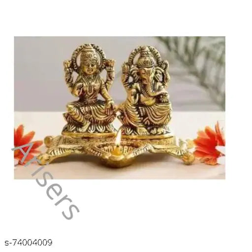 Gold brass Ganesh Laxmi idol with oil lamp, decorative showpiece - Indian handcrafted religious art