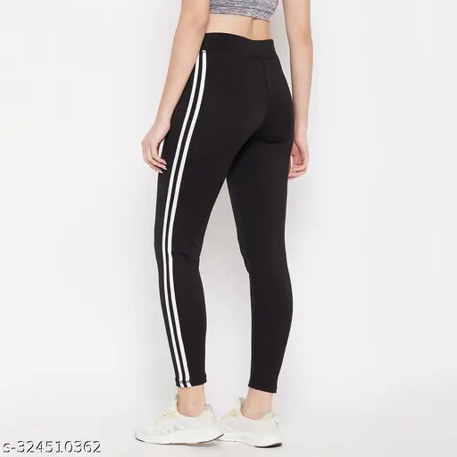 Black colorblocked lycra ankle-length jeggings for women's yoga and gym wear, available in sizes S-XXL. Made in India