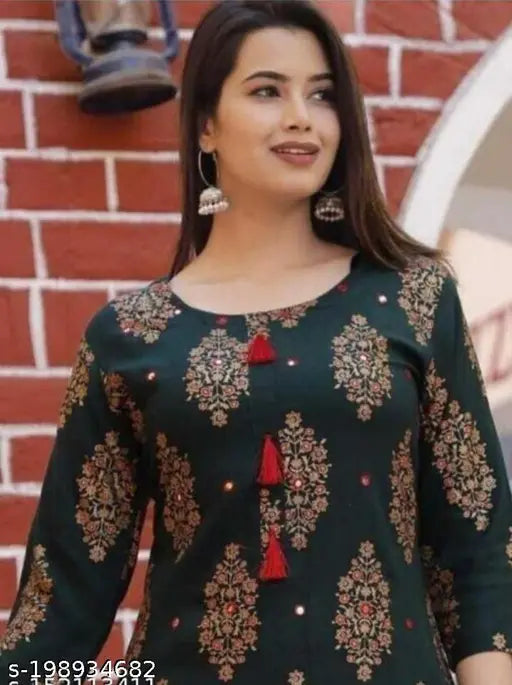 Green Rayon Kurti & Lal Sharara, printed net multicolor festive wear on display, Indian traditional embroidered casual daily wear with leggings or palazzos