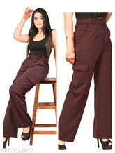 Cream cotton lycra cargo trouser, high rise with slanted inset pocket and flap patch, suitable for casual and formal wear. Size 26, 28, 30, or 32