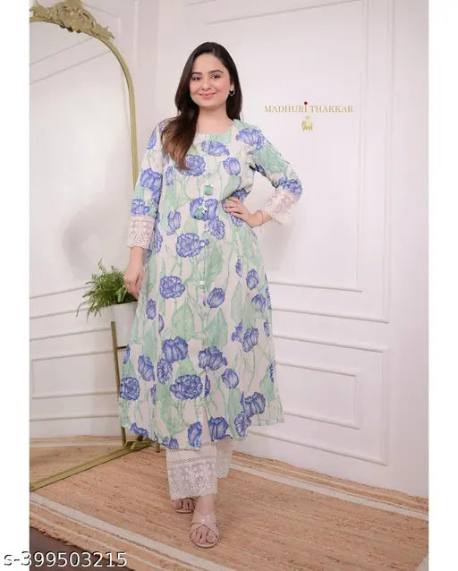 Blue women's rayon kurta set with dupatta and pants, printed net design, three-quarter sleeves