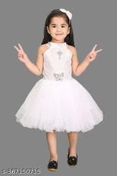 White cotton linen sleeveless embellished net princess frock for girl on hanger