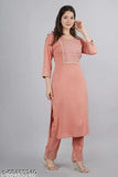 Peach rayon kurta pant set with embroidered net, three-quarter sleeves, and palazzos bottoms - Indian women's fashion for semi-formal occasions