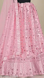 Stunning pink embroidered net party wear Lehenga Choli set with 2.5m dupatta, semi-stitched blouse. Embellished with glitter zari work for weddings and special occasions. Indian-inspired design for women's Diwali or Navratri celebrations