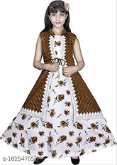 Ethnic party wear cotton blend gown for kids, embellished net design, sleeveless style. Perfect fit with corsage, suitable for various occasions like festivals and parties. Available in colors silver, light green, pink. Size options include 4-5 years, 5-6 years, 8-9 years, etc., made in India