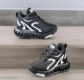 Black mesh FIT 1 boy's shoe with lace-up detail, offering comfort and quality for active play