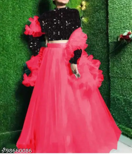 Trending flared sequined velvet Lehenga Choli with embroidered net dupatta, showcasing nine vibrant colors for festive events. Net Lehenga, self-designed silk Choli, dry clean only