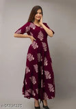 Maroon printed rayon gown with three-quarter sleeves, casual look kurti for women, suitable for office, temple, or festivals