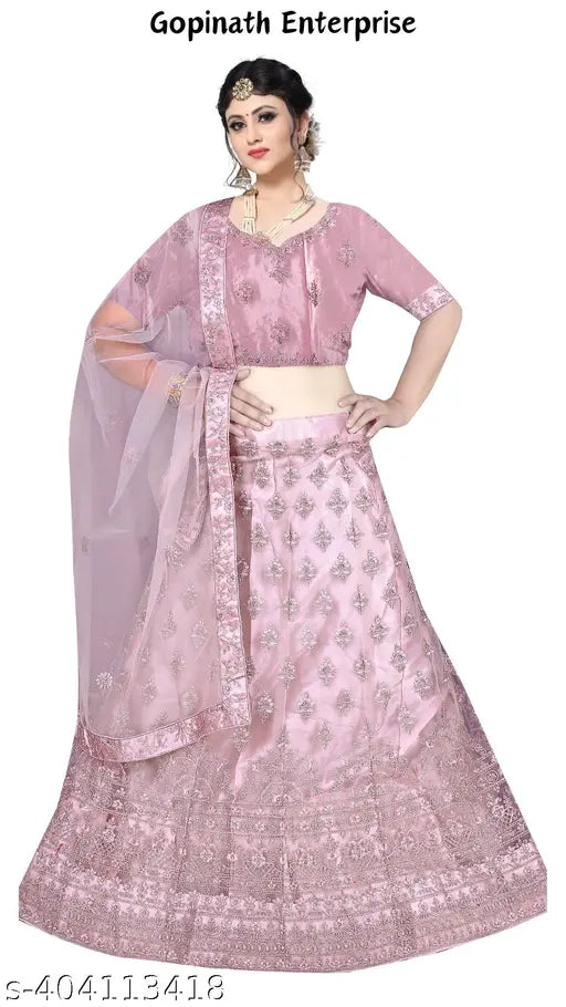 Heavy net diamond work designer lehenga choli in yellow, embellished with intricate embroidery. Indian bridalwear featuring choli and dupatta set