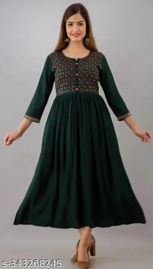 Green viscose rayon three-quarter sleeve kurti with embroidered pattern, Indian-origin fashion piece for M, L, XL, XXL