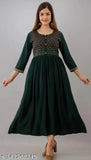 Green viscose rayon three-quarter sleeve kurti with embroidered pattern, Indian-origin fashion piece for M, L, XL, XXL