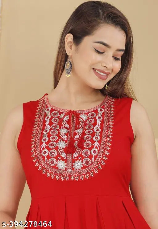 Red rayon kurta set with sharara and dupatta: Rashi Women's rayon ethnic outfit features sleeveless kurti, sharara bottomwear, and matching dupatta for a versatile addition to any wardrobe