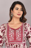 Purple rayon blouse with printed combo, three-quarter sleeves, size S-XXXL. Fashionable women's top on display