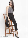 Black checked crepe sleeveless jumpsuit by Magnetic Designs, perfect for women's fashion events