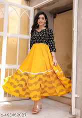 Yellow rayon calf-length printed kurti with round neck and 3/4 sleeves for women, paired with matching dupatta