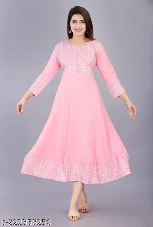 Beautiful pink rayon anarkali kurti for daily/office wear, three-quarter sleeves, solid print. Made in India