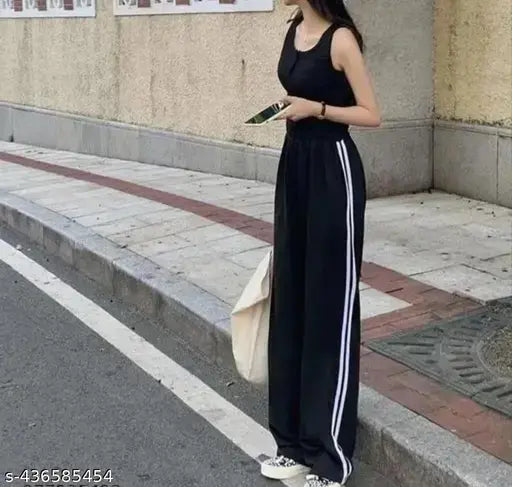Black cotton piping trouser, baggy type payjamas for women (S, M, L, XL) - stylish solid joggers with side stripes and pockets, soft fabric from India