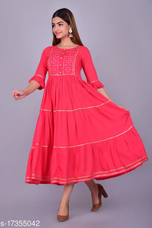 Embroidered rayon blend straight kurta for women, three-quarter sleeves, Indian embroidery design on neutral backdrop