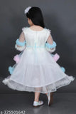 Embroidered net, long-sleeved fancy frock for kid girls. Indian handcrafted kid's dress on mannequin