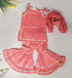 Red cotton printed kurti sharara set for baby girls with dupatta, featuring Anarkali top and elasticized sharara bottom. Ethnic look with gota patti and dori details, suitable for Indian festivals like Diwali, Janmashtami, and Rakhi. Sizes available from 6-12 months to 5-6 years. Handcrafted in India