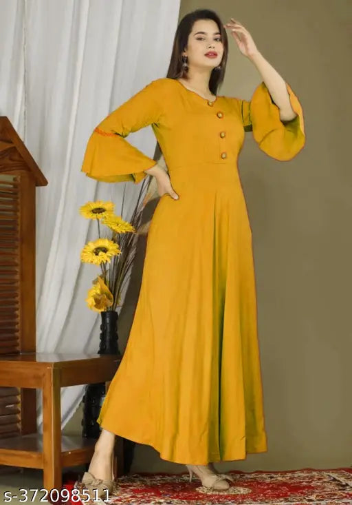 Yellow rayon women's kurti, stylish design, affordable price, ideal for daily wear and festivals