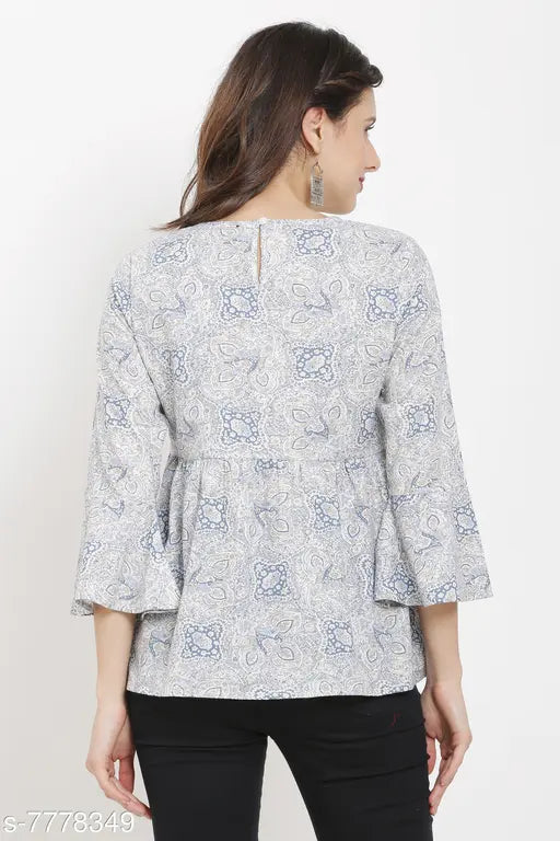 White printed cotton bell sleeve top, three-quarter sleeves, vibrant pattern on natural fabric, women's fashion from India