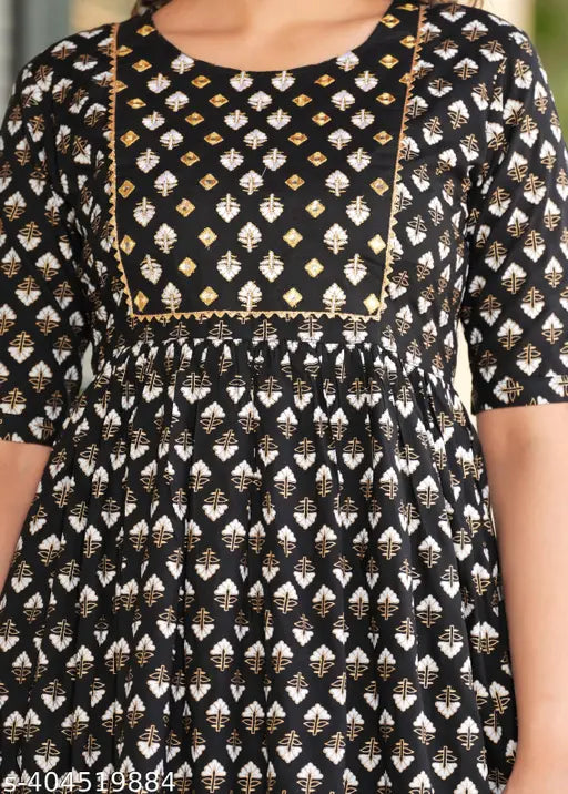 Gold layered maroon tiered rayon kurti, three-quarter sleeves, printed design