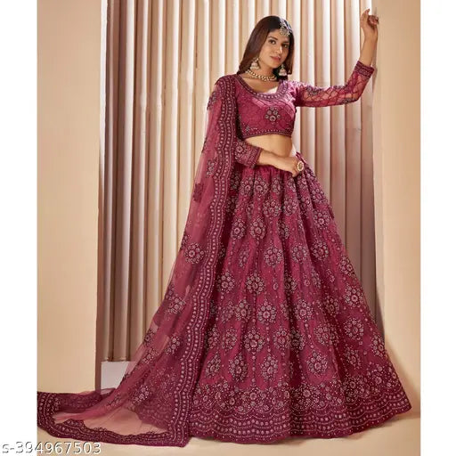Designer embroidered net lehenga set, free size, intricate Indian bridal wear with choli and dupatta