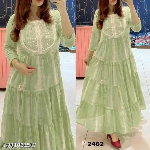 Green printed combo kurti set with three-quarter sleeves, available in sizes M-XXXXL. Indian women's party wear with included dupatta