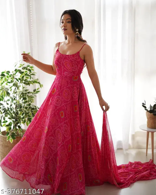 Pure orange chiffon floral print anarkali with dupatta set, fully flared and ready to wear. Soft lightweight chiffon bandhej fabric with micro cotton inner. Approx 54-55 inch length, padded, fancy backless dori pattern gown. Inner: micro cotton full liner. Dupatta: 2.3 mtr pure soft lightweight chiffon bandhej print border with triangle lace work. Available in sizes S-XXL, India origin