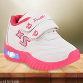 White and pink Prattle foot LED Velcro shoes for little kids, lightweight outdoor sports shoes with comfortable insole and flexible, non-skid sole. Ideal for parties, dance, evening events, music festivals, or celebrations. Suitable for all seasons. Made in India