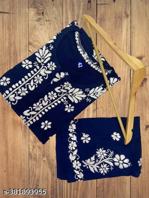 Embroidered Rayon Chikankari kurti and pants set, traditional Indian fashion on display