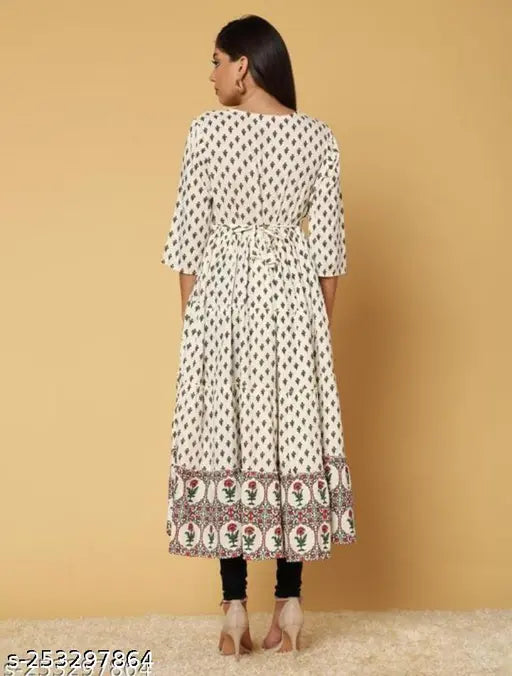 Cream floral print viscose rayon three-quarter sleeve gown, embroidered border on Indian fashion
